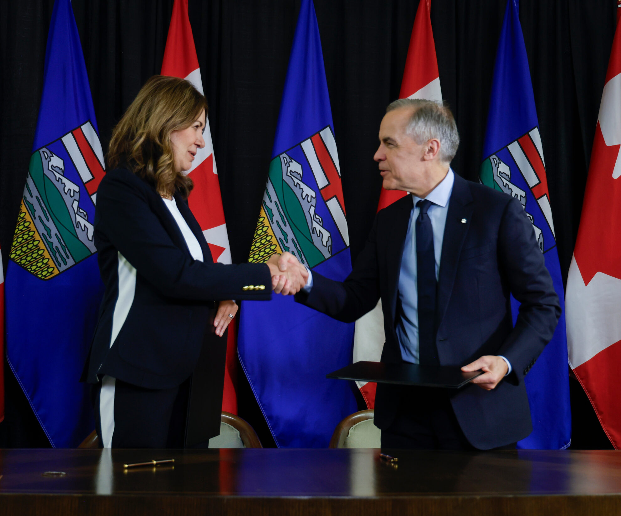 Canada’s prime minister and Alberta’s premier sign pipeline deal that ...